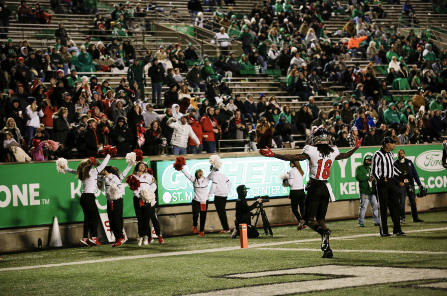 Hilltopper wideout Daewood Davis celebrates with the WKU crowd at Joan C. Edwards Stadium following a successful touchdown play during WKUs 53-21 win over Marshall on Nov. 27, 2021.
