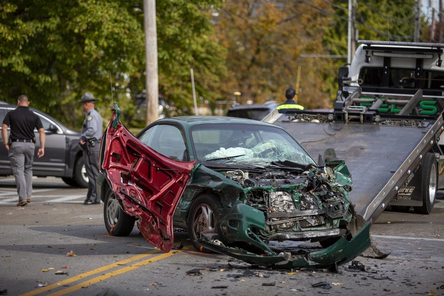 The stolen vehicle that caused the crash at the intersection of East 13th and State Street is towed a few hours after the car crashed around 9:30 a.m. Tuesday, Nov. 9, 2021.