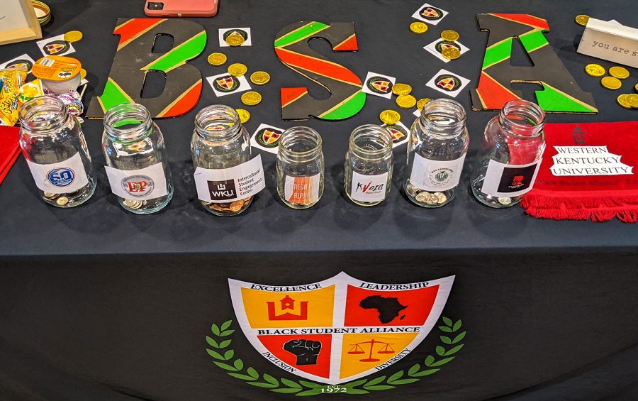 The Black Student Alliance (BSA) Penny Wars fundraising table waits for donations in DSU. The fundraiser will continue of the rest of November on Tuesdays and Thursdays from 12-2.