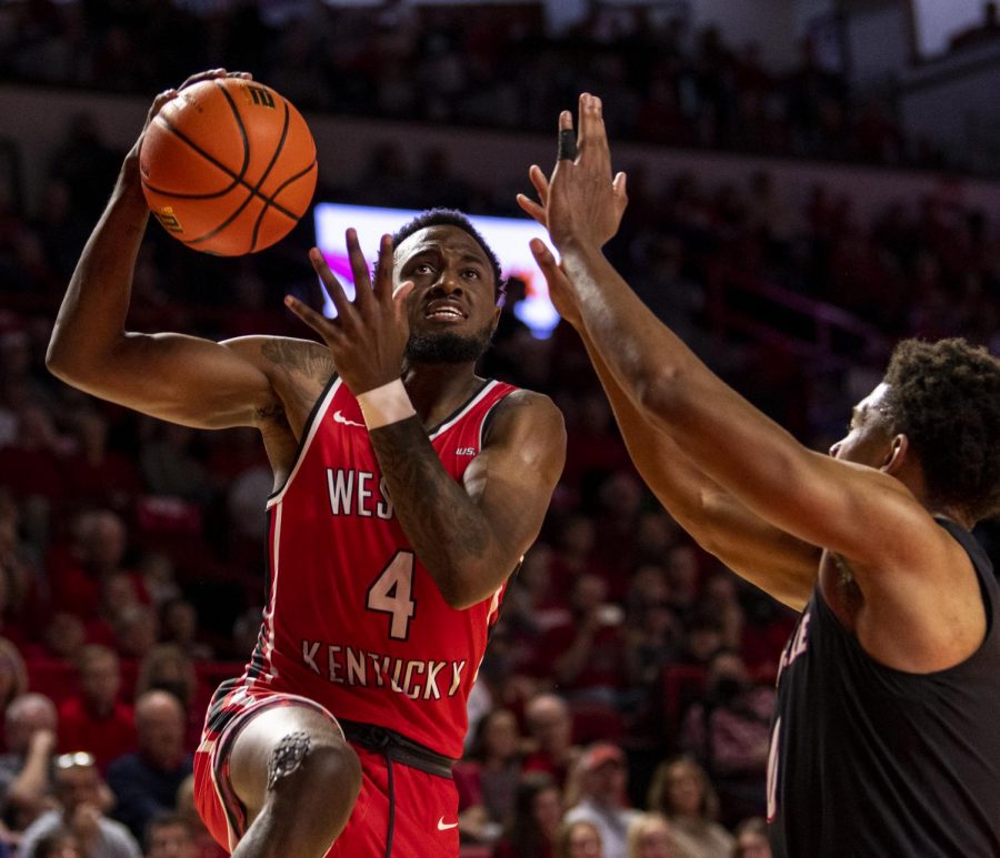 WKU+guard+Josh+Anderson+%284%29+jumps+for+a+layup+during+the+WKU+vs+University+of+Louisville+basketball+game+at+Diddle+Arena+on+Dec.+18%2C+2021.