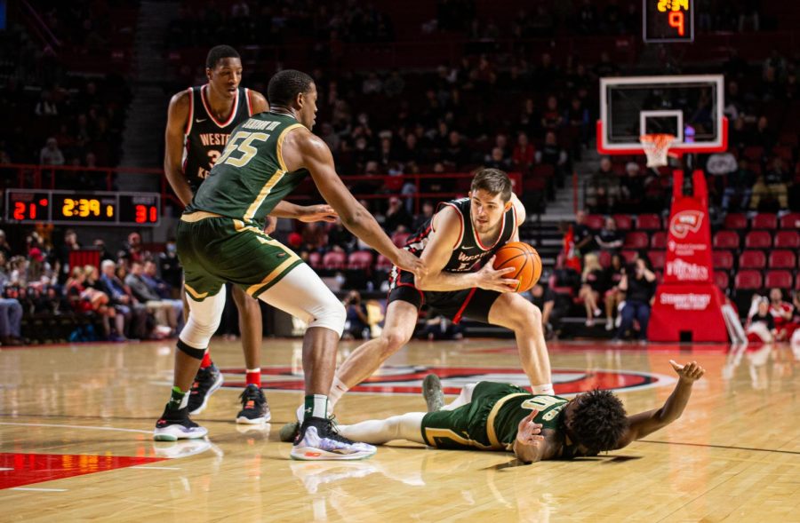 Hilltoppers Luke Frampton pushes through the defense of UAB to have a look for a basket during their match in Diddle Arena on Jan. 27.
