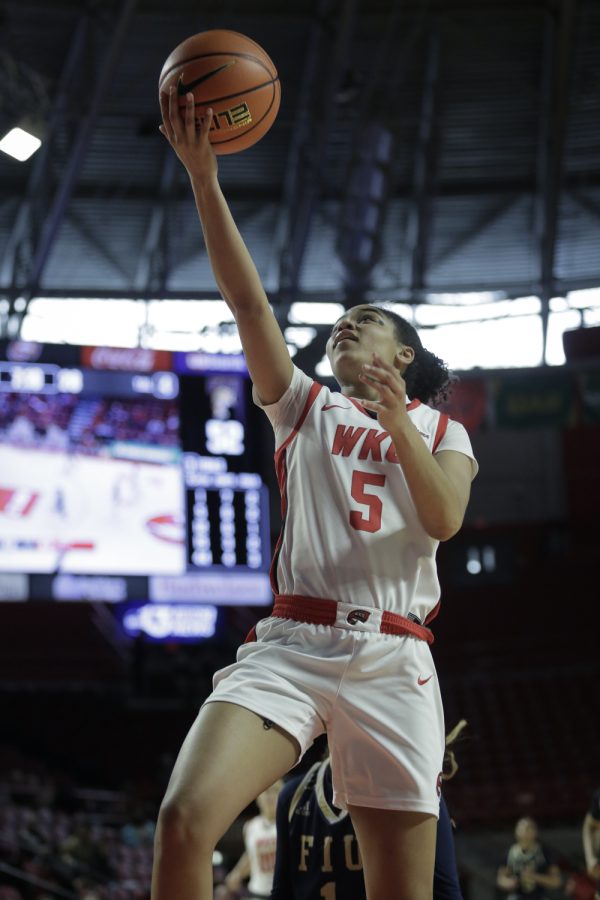 WKU Lady Topper freshman guard Mya Meredith (5) sails toward the basket for a layup Saturday afternoon, Jan. 22 of 2022 during a match against the FIU Panthers in Diddle Arena. FIU lost the match 87-66.