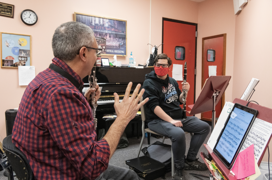 Here, Cipolla holds a one-on-one clarinet lesson with one of his students in his office on Friday afternoon, Jan. 28 of 2022. 