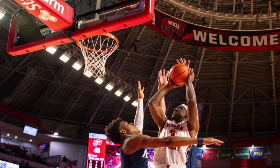 WKU+senior+forward+Jarius+Hamilton+attempts+a+basket+during+the+game+against+the+Rice+Owls+on+Jan.+13%2C+2022.