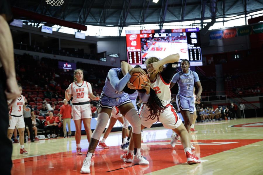 Lady Toppers freshman forward Gabby Mcbride (42) , attempts to keep possession of the ball from Old Dominion Lady Monarchs during their matchup on Feb. 5th in Diddle Arena.