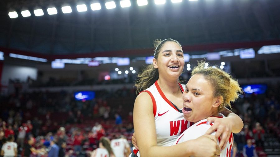 Guard Meral Abdelgawad is embraced by her teammate forward gabby McBride after a tense win against MTSU on Saturday, Feb. 26. WKU won in overtime 93-97.