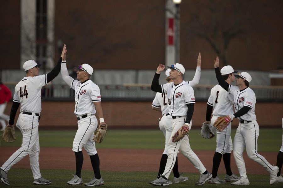 The Baseball team celebrates a win against Western Illinois on the opening day of the 2022 season on Friday, Feb 18. WKU won 6-4.