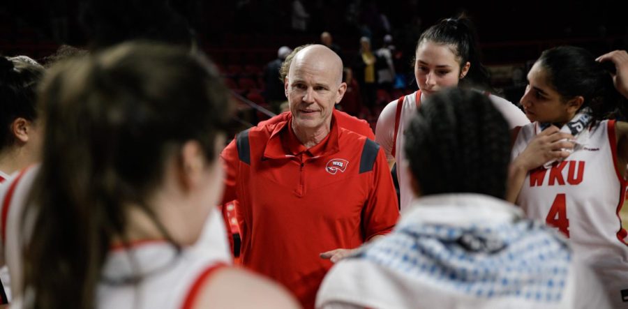 Lady Hilltoppers head coach Greg Collins talks with his team after their 57-71 victory over the Old Dominon Lady Monarchs in Diddle Arena on Feb. 5th.