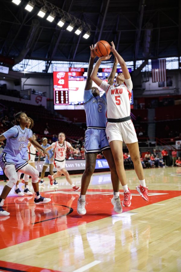 Lady Toppers freshman guard Mya Meredith (5), puts up a shot thorugh the block of Old Dominion Lady Monarchs graduate student guard Iggy Allen (2) during their matchup on Feb. 5th in Diddle Arena.