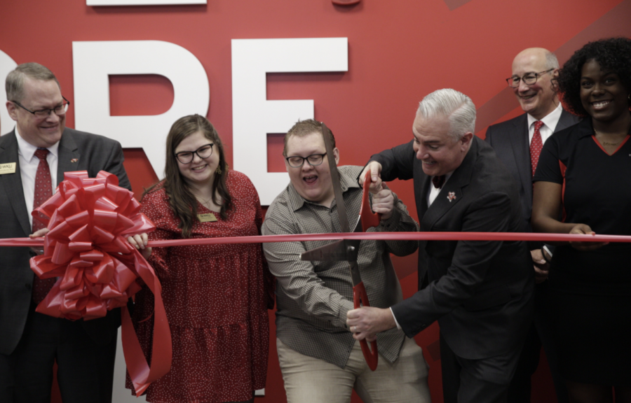 President Timothy Caboni and Normal Hall resident Jake Jones cut the ribbon to officially dedicate WKUs First Year Village on Feb. 23, 2021.