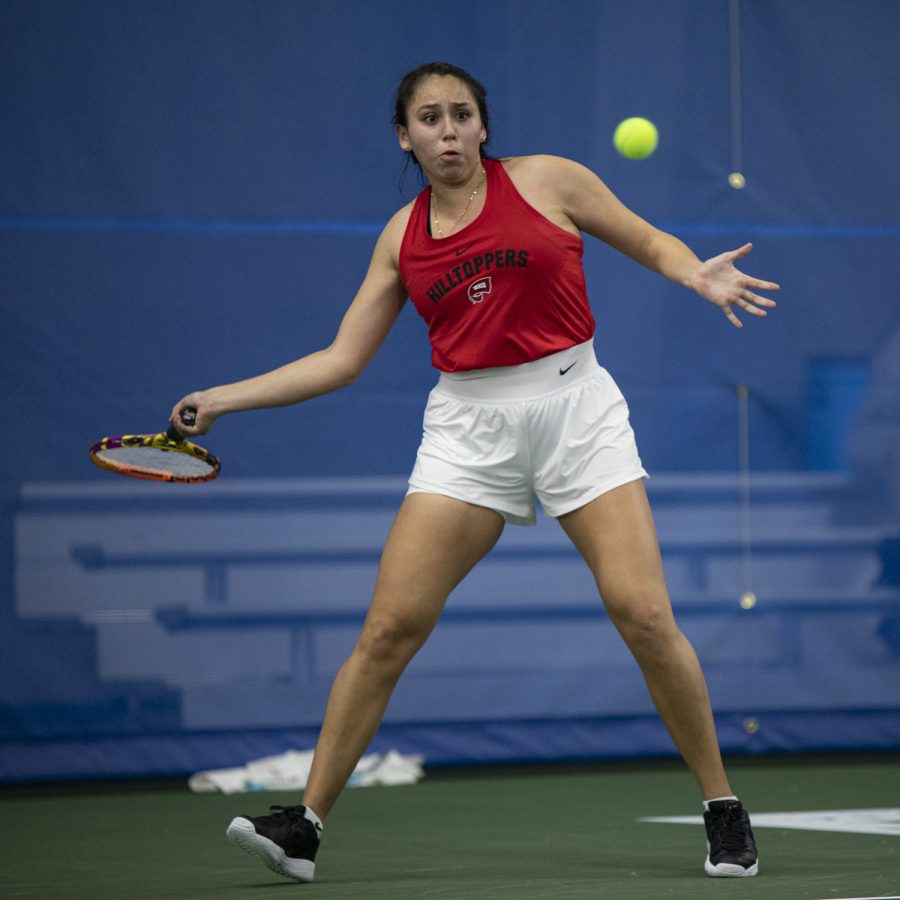 Western Kentucky University Hilltoppers redshirt sophomore Paola Cortez backhands the ball to Indiana University–Purdue University Indianapolis Jaguars redshirt senior Meghan Bernard on the afternoon of Sunday, Feb. 6, 2022, at Michael O. Buchanon Park’s tennis facility. WKU won the match 7-0.