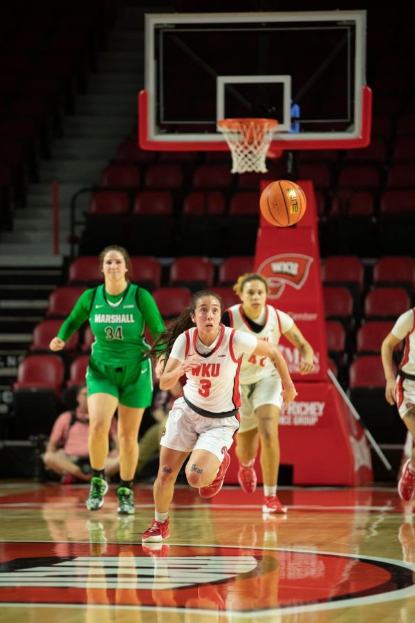 Alexis Mead, freshman guard, attempts to catch the ball at WKU Lady Topper’s game against Marshall on Wednesday, March 2nd where they lost 80-62.