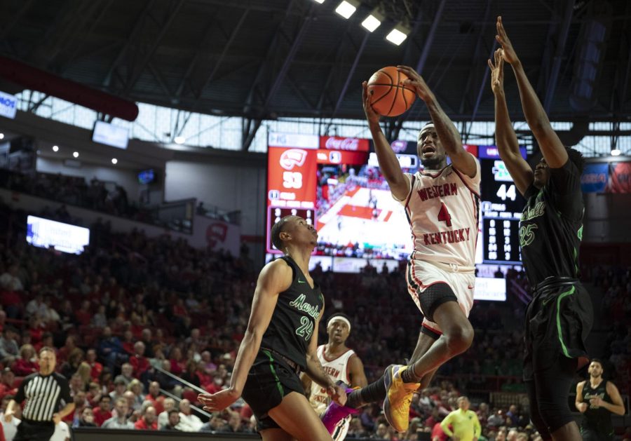Guard Josh Anderson goes for a two-pointer agains Marshall on Saturday, March 5. WKU won 69-78.