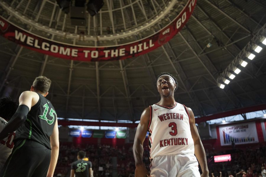 Forward Jairus Hamilton celebrates with the crowd after making a dunk on Saturday, march 5. WKU won over Marshall 69-78.