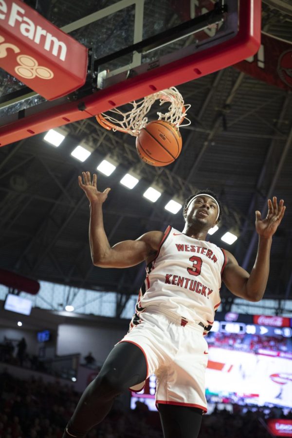 Forward Jairus Hamilton makes a dunk against Marshall on Saturday, March 5. Hamilton made 16 points, two assists and six rebounds in 21 minutes of play. WKU won 69-78.