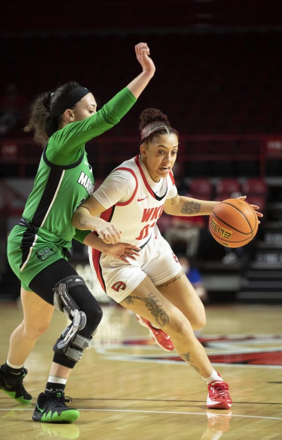 Forward Jaylin Foster on a drive against Marshall on Wednesday, March 2. WKU lost 80-62.