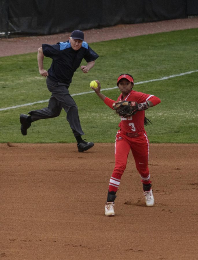 Hilltoppers+Softball%E2%80%99s+junior+infielder+TJ+Webster+%283%29%2C+makes+a+throw+to+first+base+to+add+another+out+to+the+scoreboard+during+their+matchup+with+the+Razorbacks+of+the+University+of+Arkansas+during+their+matchup+on+March+21st+at+the+WKU+Softball+Complex.