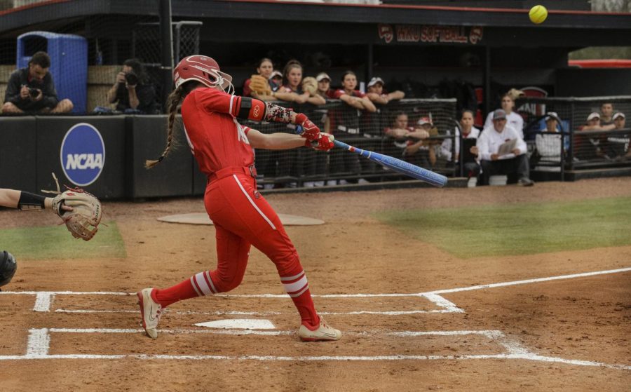 WKU+Softball+junior+outfielder+Brylee+Hage+%2811%29+makes+contact+during+WKUs+matchup+with+the+Arkansas+Razorbacks+on+March+21%2C+2022+at+the+WKU+Softball+Complex.
