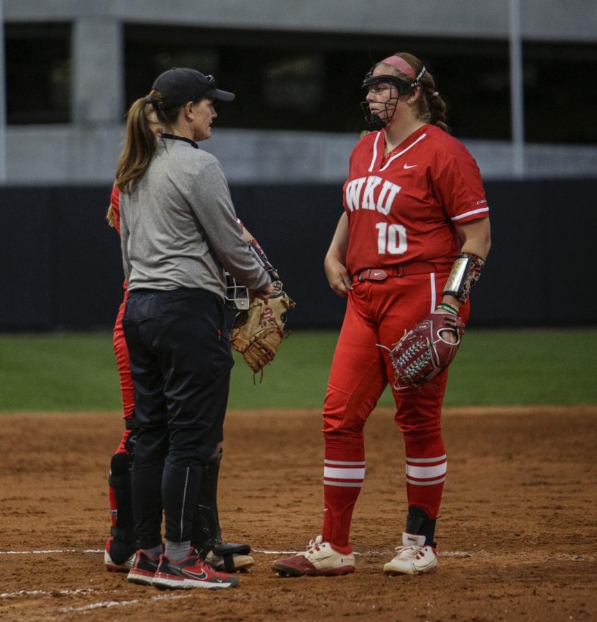 Hilltopper+Softball%E2%80%99s+head+coach+Amy+Tudor+talks+with+the+catcher+Shelby+Nunn+%2810%29+late+in+their+game+against+the+Razorbacks+of+the+University+of+Arkansas+on+March+21st+at+the+WKU+Softball+Complex.