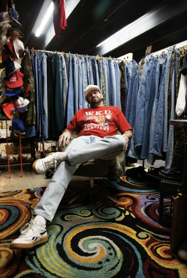 Gatlin Milam, owner of Vette City Vintage, sits in his booth located at Consignment Corner on 31 W Bypass. Gatlin runs the store with his wife, Maddie.