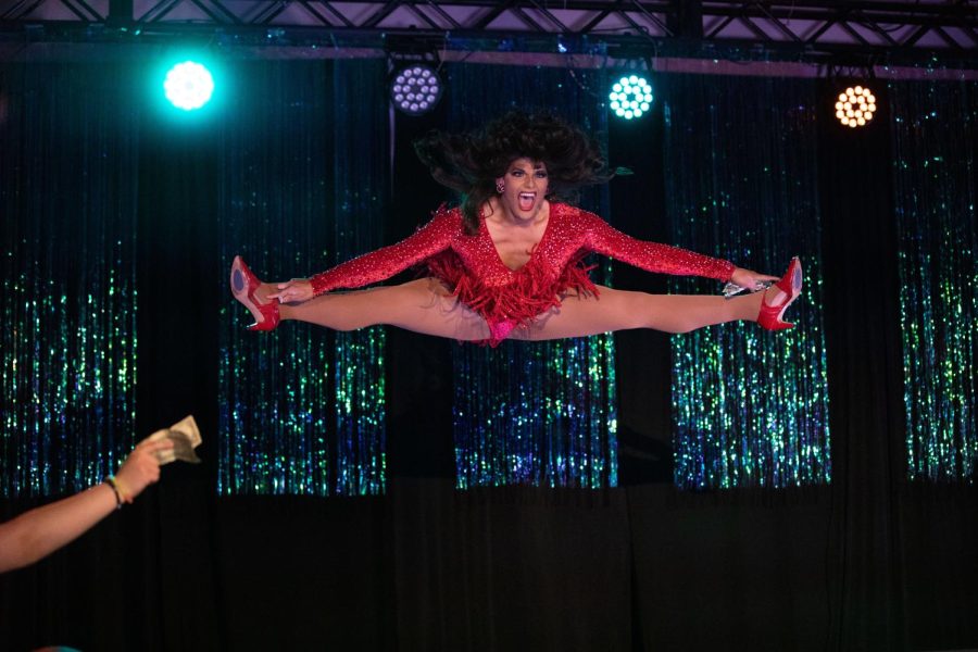 Drag Queen Venus Knight does the splits in the air during a performance of “Through the Disco Inferno Mix” at the WKU Housing and Residence Life on Thursday, April 7th. Venus Knight currently holds the title of Miss Bowling Green Pride 2022.