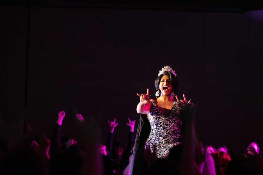 Drag Queen Venus Knight signs “I love you,” to the audience during her performance of “I Have Nothing” by Whitney Houston. This was the final performance of the night at the WKU HRL Drag Show on Thursday, April 7th.