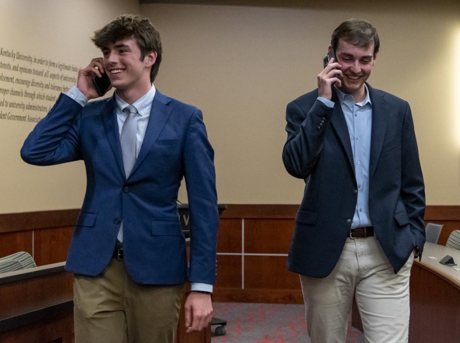 Sam Kurtz (left) and Cole Bornefeld call their moms to say they won their ticket for the Student Government Association after the election results were announced in WKU’s Student Government Association’s chamber just after midnight on April 20, 2022.