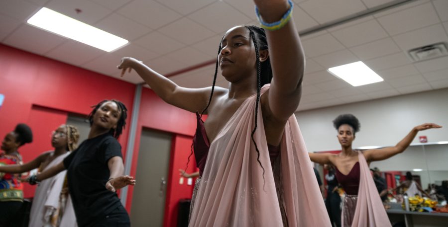 Western Kentucky University’s African Student Union hosts an International Fashion Show Thursday evening, April 21, 2022 in the auditorium of Downing Student Union.

In the greenroom backstage, students from Rwanda practice a dance number.