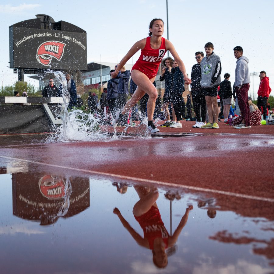 Senior Maddy Hurt competes in the steeplechase during day two of the Hilltopper Relays Saturday, April 2, 2022 at the Charles M. Ruter Track and Field Complex in Bowling Green, Kentucky on Western Kentucky University’s campus.