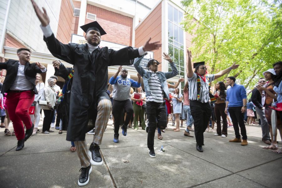Members of the WKU chapter of the Phi Beta Sigma fraternity perform a routine after their graduation ceremony on Friday, May 6. 