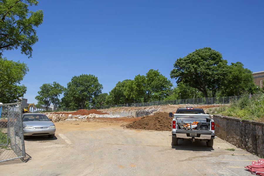 Construction underway at the front entrance of the construction site where Garrett Conference Center used to be .