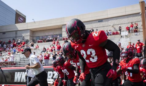 Redshirt senior linebacker Will Ignont leads the Hilltoppers onto Feix Field ahead of their matchup against Austin Peay in Bowling Green, Ky. on Saturday, Aug. 27. WKU won 38-27.