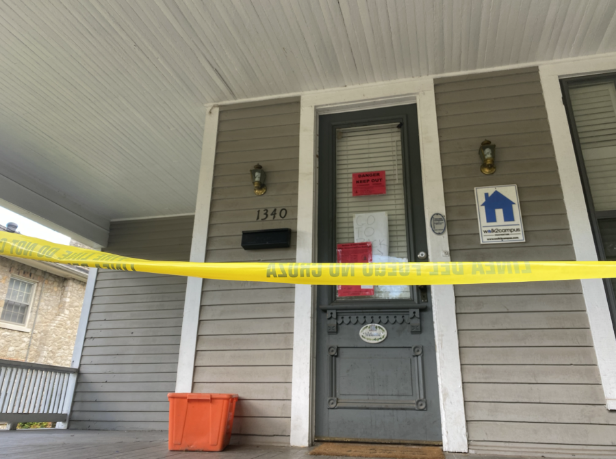 Police tape adorns the porch of 1340 State Street, which suffered a floor collapse Aug. 17, 2022.
