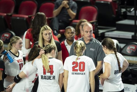 The Hilltoppers huddle during a timeout during their home matchup with FIU on Friday, Sept. 30, 2022 in E.A. Diddle Arena on WKU Campus in Bowling Green, Ky. WKU won 3-0.