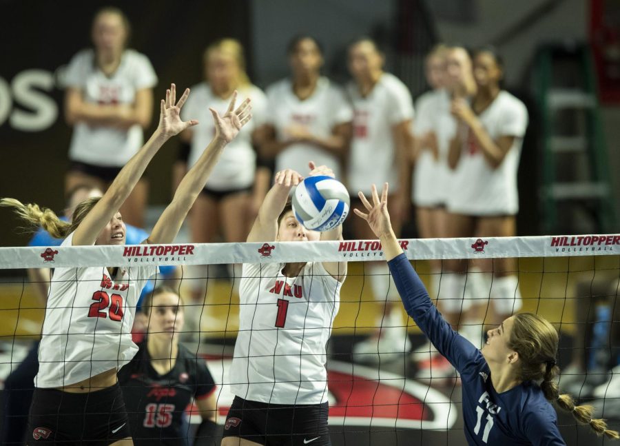 WKU senior outside hitter makes a block against FIU during a Friday, Sept. 30, 2022 matchup in E.A. Diddle Arena on WKU Campus in Bowling Green, Ky. WKU won 3-0.