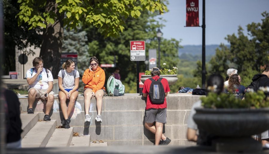 Students and faculty wait outside while WKU Police Department and Bowling Green Fire Department respond to a potential explosive device being found at Cherry Hall on WKU Campus in Bowling Green, Ky. on Wednesday, Sept. 14.