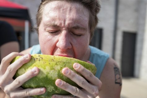 Caleb Spain takes part in a watermelon eating contest during the watermelon bust at the Lambda Chi Alpha chapter house on WKU Campus in Bowling Green, Ky. on Sept. 9, 2022.