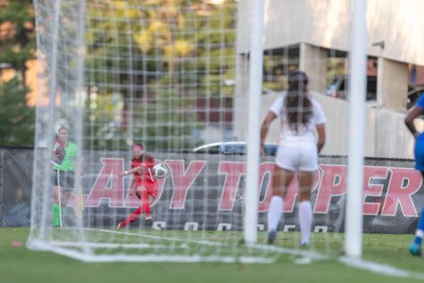 WKU #13, Katie Erwin, a senior from Louisville, Ky takes a corner kick in the Hilltoppers game against the University of Texas at El Paso on Sept. 22, 2022.  The Hilltoppers upset the Miners 1-0. 
