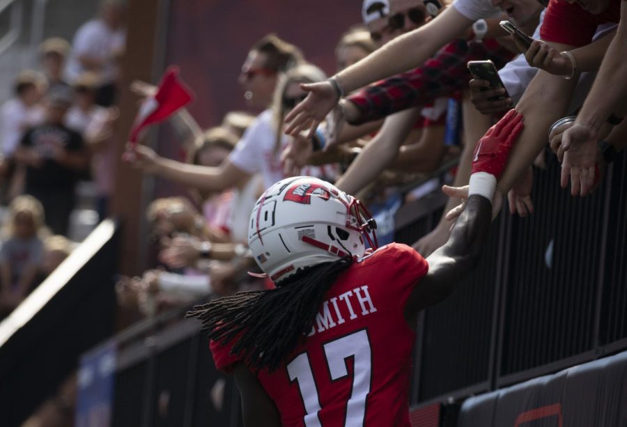 Dalvin+Smith%2C+WKU+wide+reciever%2C+celebrates+with+fans+after+the+Hilltoppers+score+a+touch+down+at+L.+T.+Smith+Stadium+on+Sept.+24%2C+2022+in+Bowling+Green%2C+Ky.+