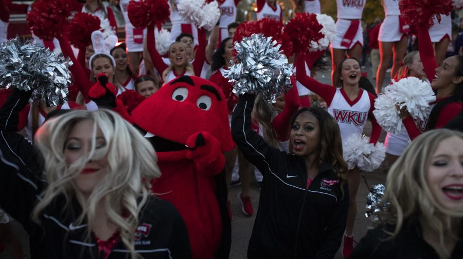 Big Red dances with the WKU dance and cheer teams during the Homecoming pep rally at Cherry Hall on Friday, Oct. 28, 2022. 