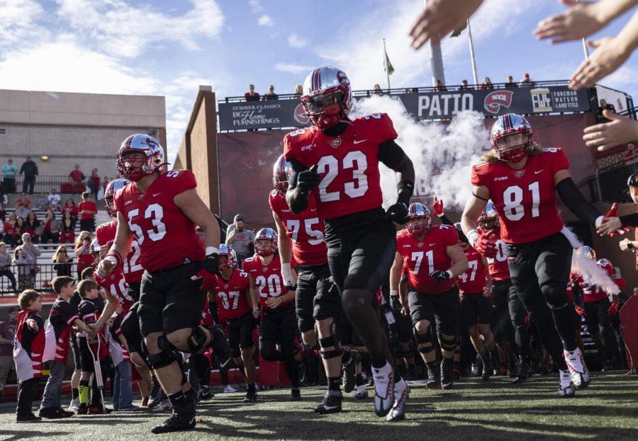 The+Hilltoppers+run+onto+Feix+Field+ahead+of+their+Homecoming+matchup+with+UNT+on+Saturday%2C+Oct.+29%2C+2022.+WKU+lost+40-13.
