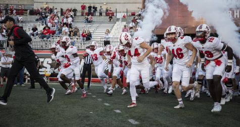 The WKU Hilltoppers football team heads on to Feix Field ahead of their match with Troy on Saturday, Oct. 1, 2022 in Bowling Green, Ky. WKU lost 34-27.