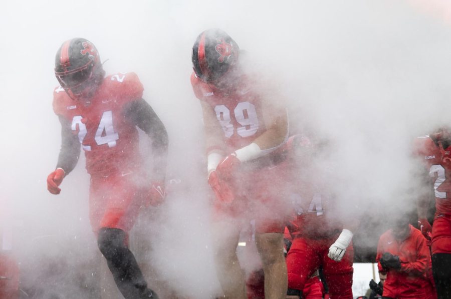 The Hilltoppers run onto Feix Field before their matchup against Rice on Saturday, Nov. 12, 2022. WKU won 45-10.