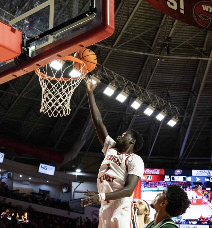 WKU redshirt sophomore forward/center Fallou Diagne (1) makes a two-pointer during the matchup with Wright State in E.A. Diddle Arena on Saturday, Dec. 10, 2022. WKU won 64-60.
