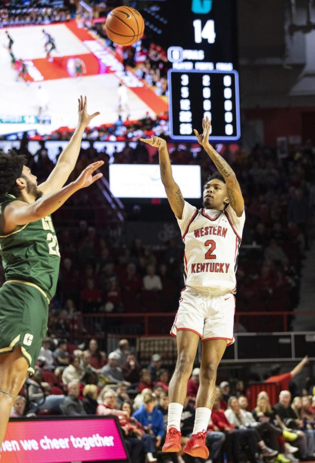 Senior guard Jordan Rawls (2) shoots a three-pointer during the matchup with Charlotte in E.A. Diddle Arena on Saturday, Jan. 21, 2023. Rawls made nine field goals and a total of 25 points during 33 minutes of play. WKU lost 75-71.