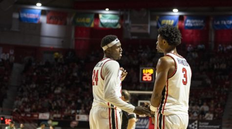 Junior forward Tyrone Marshall Jr. (24) and fifth year forward Jairus Hamilton (3) speak after a break in the game during the matchup with Charlotte in E.A. Diddle Arena on Saturday, Jan. 21, 2023. WKU lost 75-71.