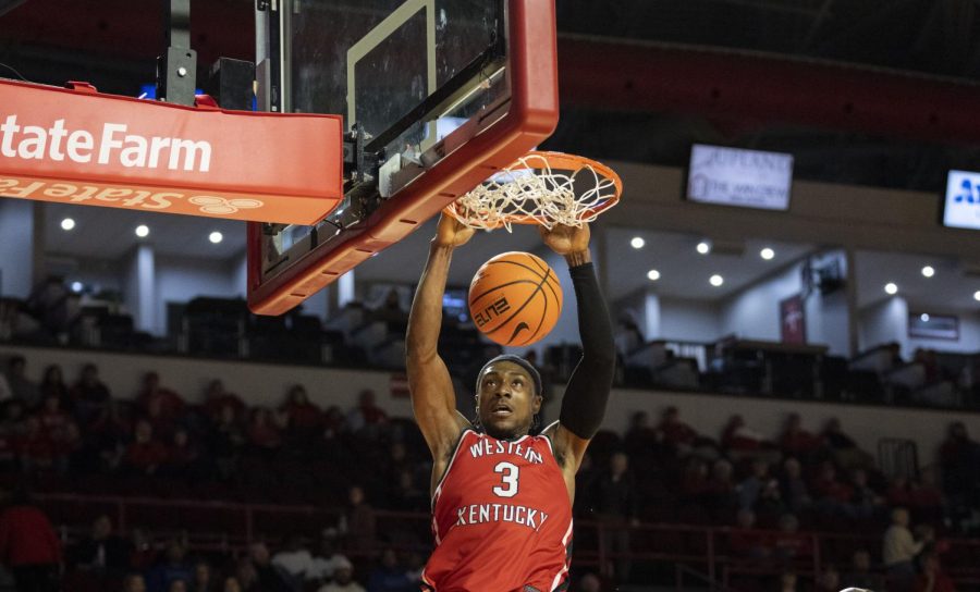 Fifth year forward Jairus Hamilton (3) makes a dunk during the matchup with FAU in E.A. Diddle Arena on Monday, Jan. 16, 2023. Hamilton managed eight points and shot three for four on free throws with one assist in 33 minutes of play. WKU lost 76-62.