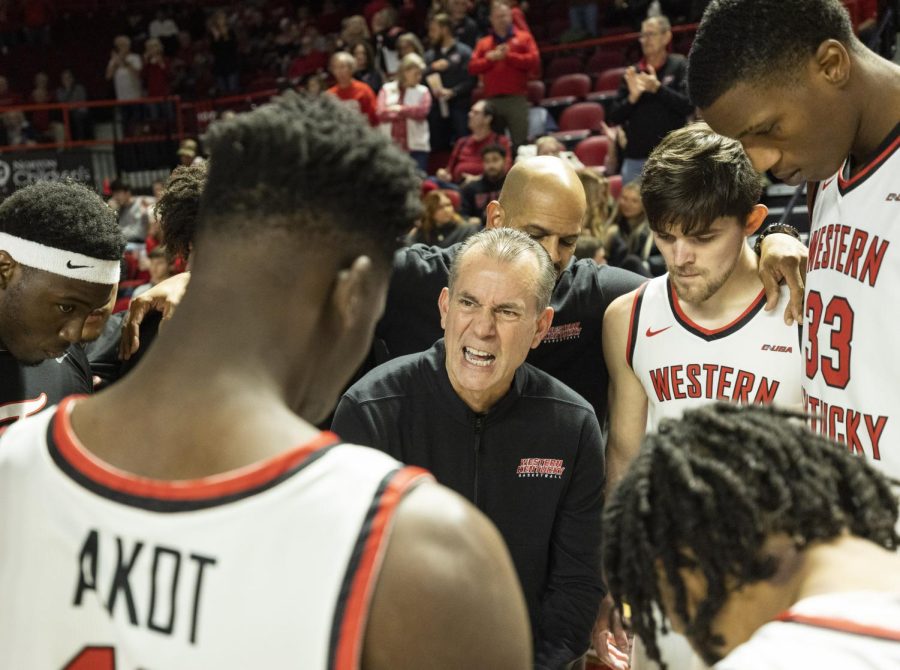 Associate head coach Phil Cunningham hypes up the Hilltoppers ahead of their game against University of North Texas in E.A. Diddle Arena on Thursday, Jan. 5, 2023. Cunningham filled in for head coach Rick Stansbury who is on sick leave. WKU lost 70-66.