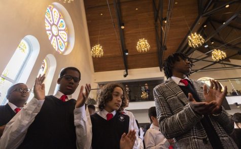 Members of the Bowling Green Middle School Black Male Scholars program attend the Dr. Martin Luther King Jr. holiday celebration service at State Street Baptist Church on Monday, Jan. 16, 2023. 