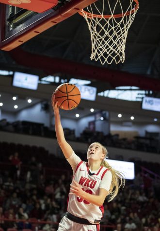 Freshman guard Josie Gilvin (33) puts up an uncontested bank shot against UAB in E.A. Diddle Arena on Wednesday, Jan. 11, 2023. Gilvin made three steals and nine points in 26 minutes of play. WKU won 75-71.